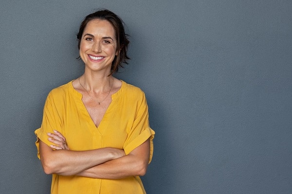 Happy woman in orange