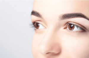 Woman with beautiful eyebrows close up