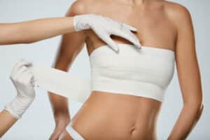 Young woman after explant and breast lift in Dallas